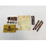 A selection of WW2 and later medals and militaria. To include: A WW2 medal group attributed to Major