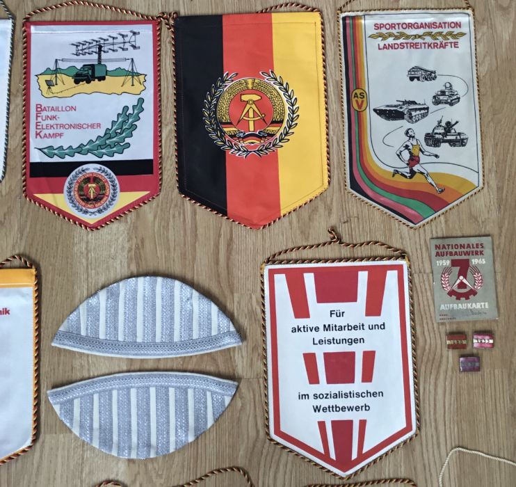 A selection of post war East German DDR, insignia and pennants. To include: a pair of matched - Image 4 of 6