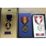 American WW2 period Purple Heart in Original Case with two other American National Defence Medals.