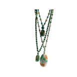 Three Chinese jade sautoir necklaces in the flapper style, All the necklaces are hand knotted,