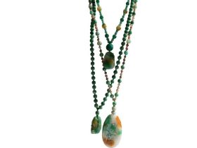 Three Chinese jade sautoir necklaces in the flapper style, All the necklaces are hand knotted,