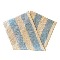 A blue and soft cream striped Durham quilt, the reverse being cream.225 x 180 cm. The vendor