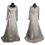 A late Edwardian wedding dress in Silk with crepe chiffon yoke and sleeves along with two veils, one