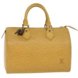 A Louis Vuitton EPI speedy bag in canary yellow leather C1997. Brass hardwear and original lock