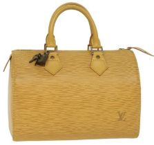 A Louis Vuitton EPI speedy bag in canary yellow leather C1997. Brass hardwear and original lock