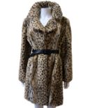 A 1960s faux leopard coat with belt and internal swing tie. Good condition with general age