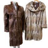 A vintage musquash fur coat from the Arctic Fur company with double cuffs and jaquard lining and a