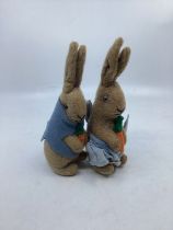 Antique pair of mohair mid C rabbits  toys c 8ins , with pale blue glass yes , one in a blue