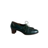 A pair of bespoke 1940s shoes in green leather by John Lobb with seamed vamp and stacked leather