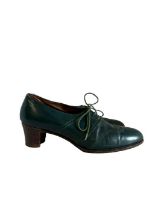 A pair of bespoke 1940s shoes in green leather by John Lobb with seamed vamp and stacked leather