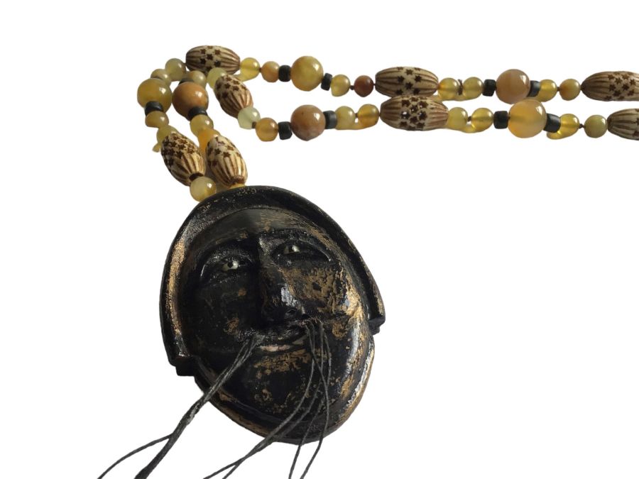 Two Chinese, hand knotted agate necklaces in the flapper style. One terminates with a carved - Image 2 of 5