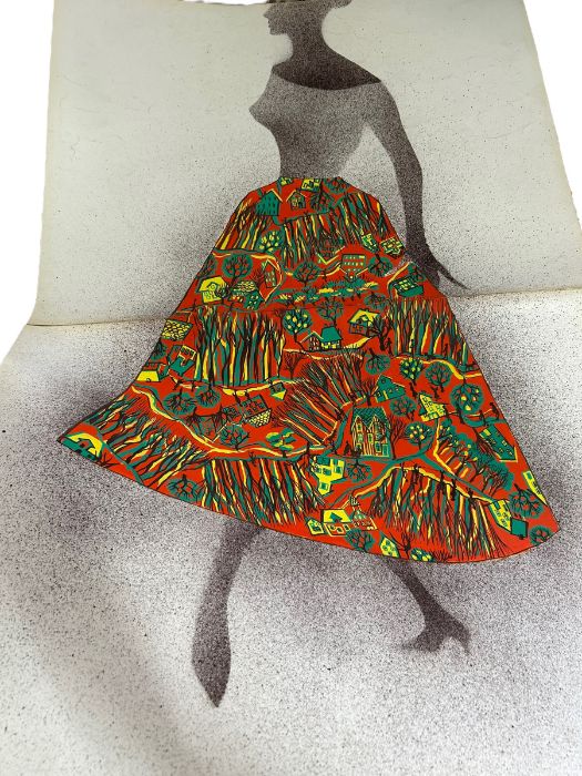 A folder of skirt fabric designs from 1956 including novelty prints, florals and abstract designs.