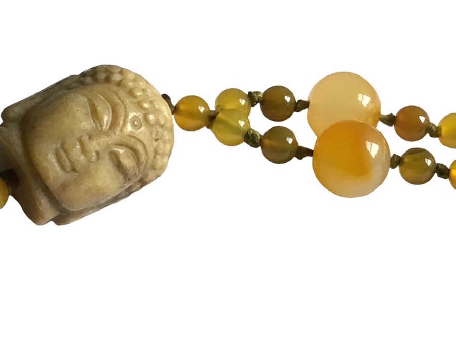 Two Chinese, hand knotted agate necklaces in the flapper style. One terminates with a carved - Image 3 of 5