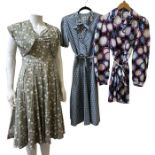 A blue and white 1940s dress with spotty print, a 50s dress with unusual painterly landscape print