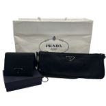 1990s Prada baguette style clutch purse in black nylon and glace leather with its dustbag and a