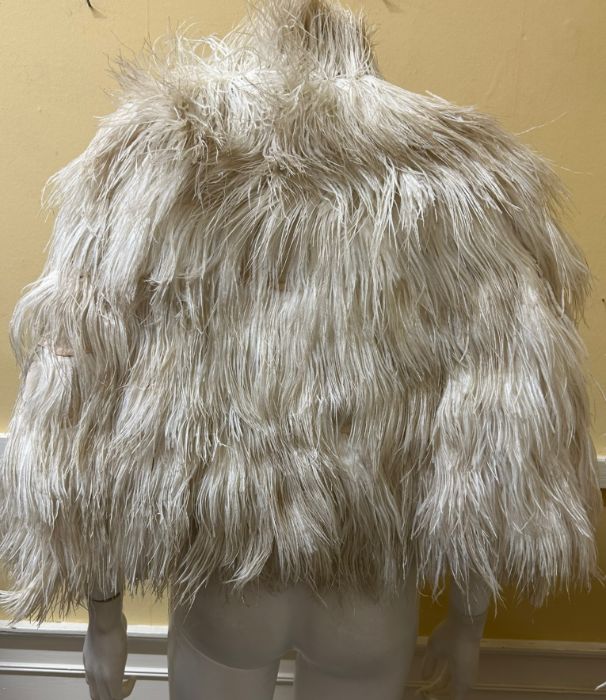 A 1920s/ 30s ostrich feather cape with rayon lining and ties and a similar ostrich feather boa. ( - Image 2 of 2