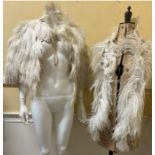 A 1920s/ 30s ostrich feather cape with rayon lining and ties and a similar ostrich feather boa. (