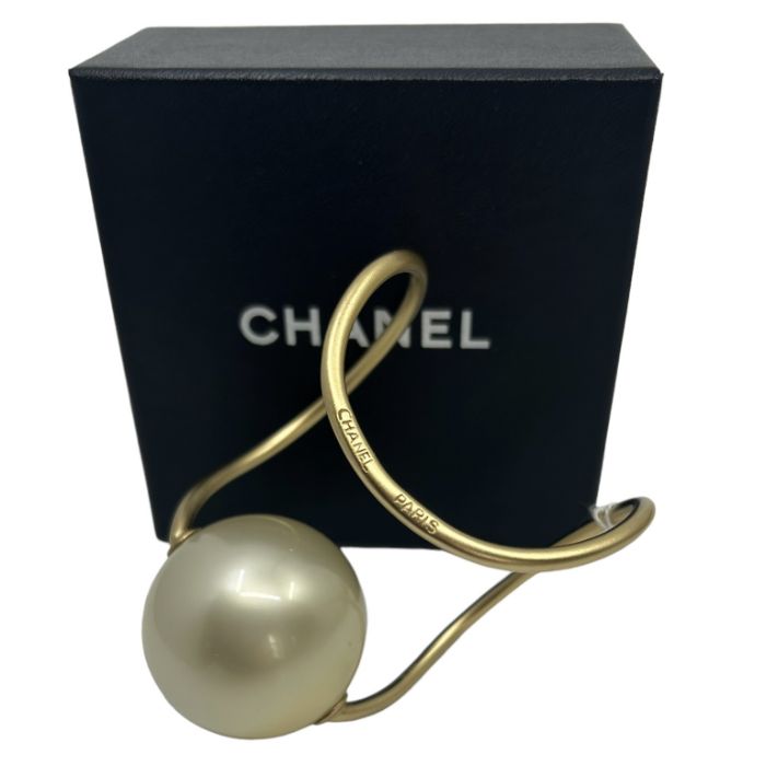 A Chanel cuff bracelet from the spring 2014 collection featuring an oversized faux pearl on a - Image 3 of 3