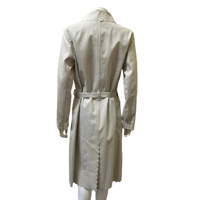 A Louis Vuitton coat in waxed canvas with scalloped edging and mother of pearl buttons, complete - Image 2 of 3