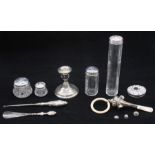 A collection of silver to include; various dressing table and toilet bottles of various sizes,