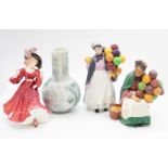 Three Royal Doulton figures including Balloon Seller HN1315 Biddy Penny Farthing HN1843 Patricia