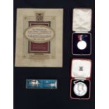 Coronation Memorabilia: A boxed Royal Mint George VI and Queen Elizabeth May 1937 medallion, a