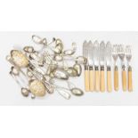 A collection of silver plated cutlery including forks, spoons etc.