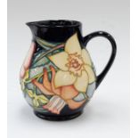 Moorcroft: A Daffodil patterned water jug, signed Shirley Hayes and dated 2001 to underneath, with