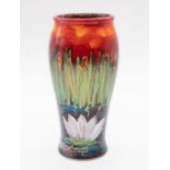 Anita Harris - A small Bullrush designed vase with orange ground background, marked and signed to