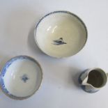 A Liverpool blue and white slop bowl painted with Man in a pavilion pattern, along with a Caughley