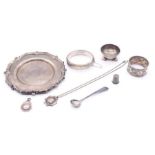 A collection of 925 silver to include: small dish, bangle, napkin ring, thimble, condiment spoon,