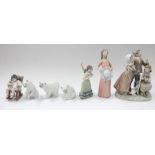 A collection of seven Lladro figures to include: Three polar bears, a young  girl in rocking