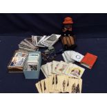 Collection of old early 20th Century postcards, cigarette cards, Norah Wellings soft toy, vintage