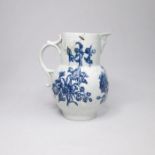 A Worcester blue and white masked spout jug, decorated with floral sprays Date circa 1780 Size