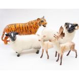A collection of five John Beswick animals, to include. Stag and  Doe. Ewe and Ram and a tiger.