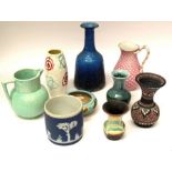 A collection of mid 20th Century vases and jugs, glass vase etc