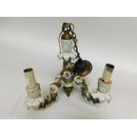 An early 20th Century Continental three branched porcelain candlestick, converted to a ceiling