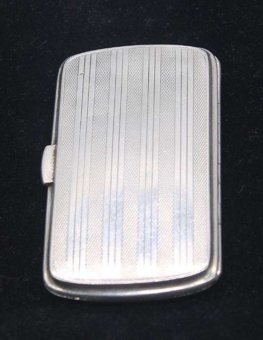 A George VI silver cigarette case, engine turned with stripped decoration, central circular - Image 2 of 4