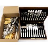 A cased set of twelve silver plated and mother of pearl fish knives and forks, within wooden case,