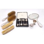 A collection of silver to include: an Edwardian dressing table set including two brushes, two hand