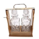 A two bottle cut glass tantalus