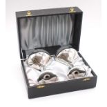 A pair of Modern silver goblets, foliate engraved stems with gilt interior bowls, hallmarked