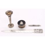 A collection of silver items to include: a small silver and tortoiseshell pill box, with crest to