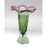 An Art Nouveau style glass vase of flower form, green and pink colourway. 29cm high x 8.5cm wide