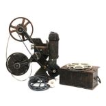 An early to mid 20th century Pathescope Made In England reel projector, with reels from the 1936