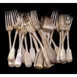 A collection of 19th Century silver fiddle pattern flatware to include: a set of six George III