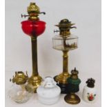 A late 19th century and 20th century collection of oil table lamps A.F.