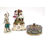 A Chelsea-style porcelain figure, a Continental decorative inkwell, stamp and quill stand, and a