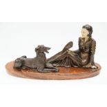 A large Art Deco lady with dog, on marble stand