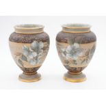 A pair of Doulton Lambeth Silicon vases with birds and flower decoration, numbered 1885, signed to